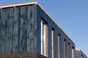 Modular kit-built small home with timber cladding