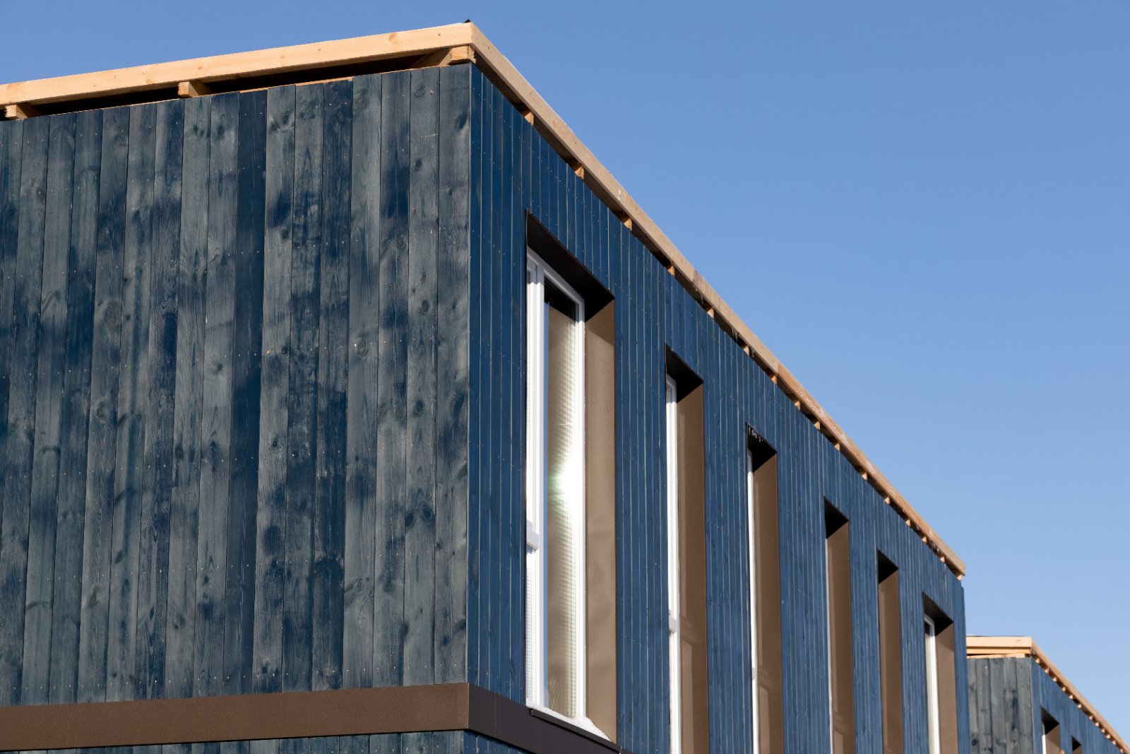 Modular kit-built small home with timber cladding