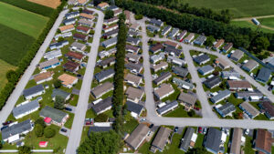 Single-storey homes along a street in a land lease community