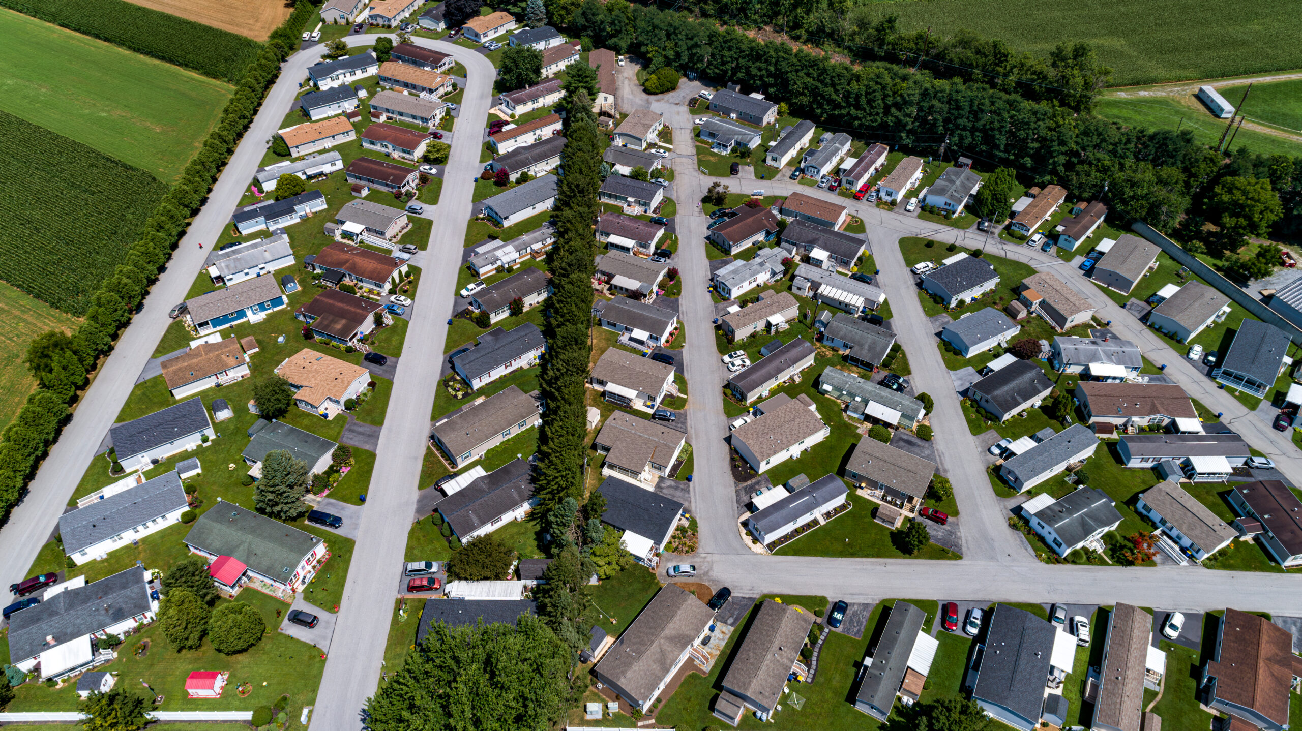 Single-storey homes along a street in a land lease community