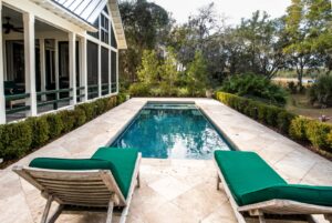 Backyard swimming pool behind an Australian home with garden — pool finance options