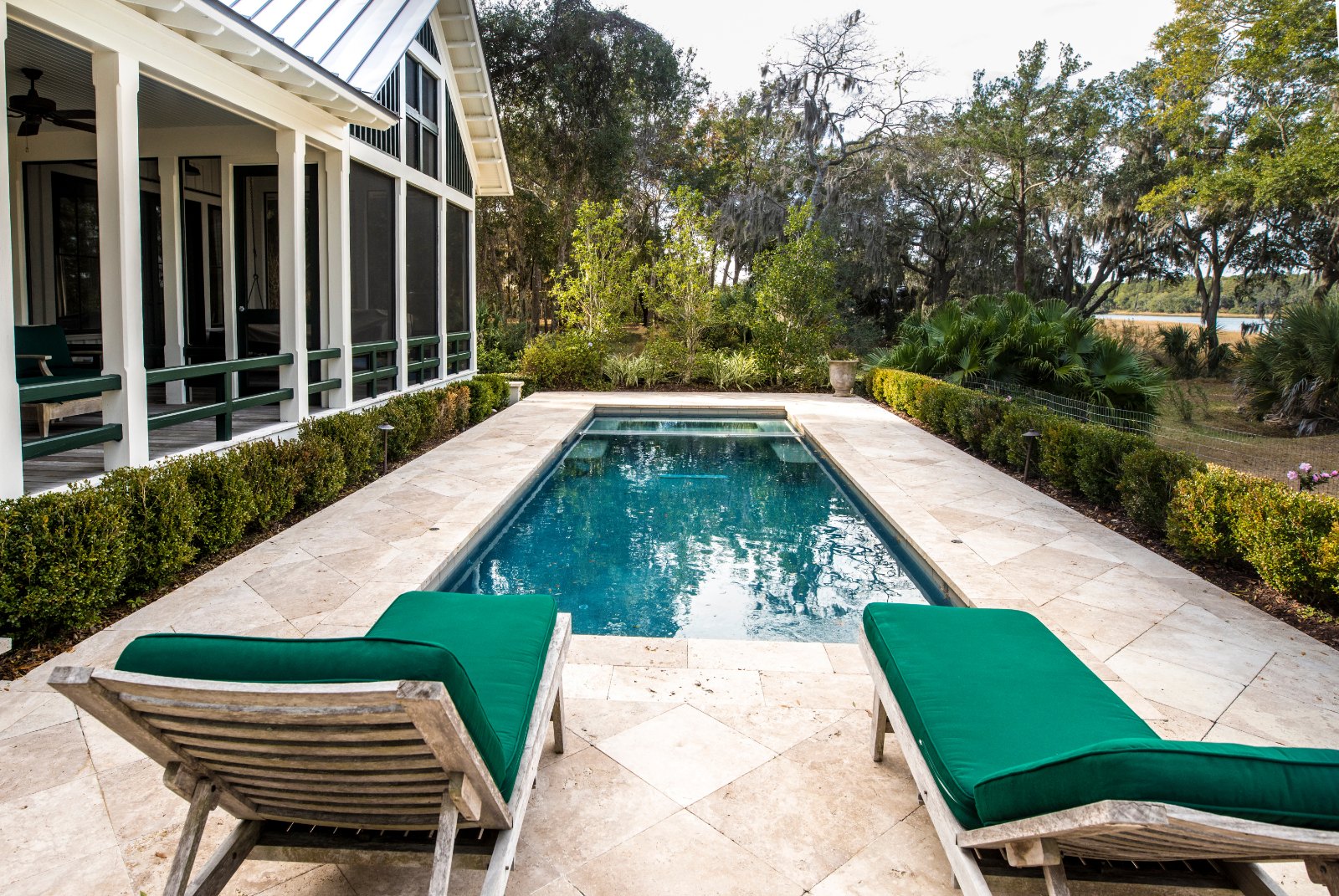Backyard swimming pool behind an Australian home with garden — pool finance options