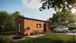 Tiny home placed in a garden with outdoor seating